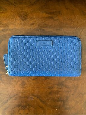 Gucci Blue GG Embossed Zip Wallet